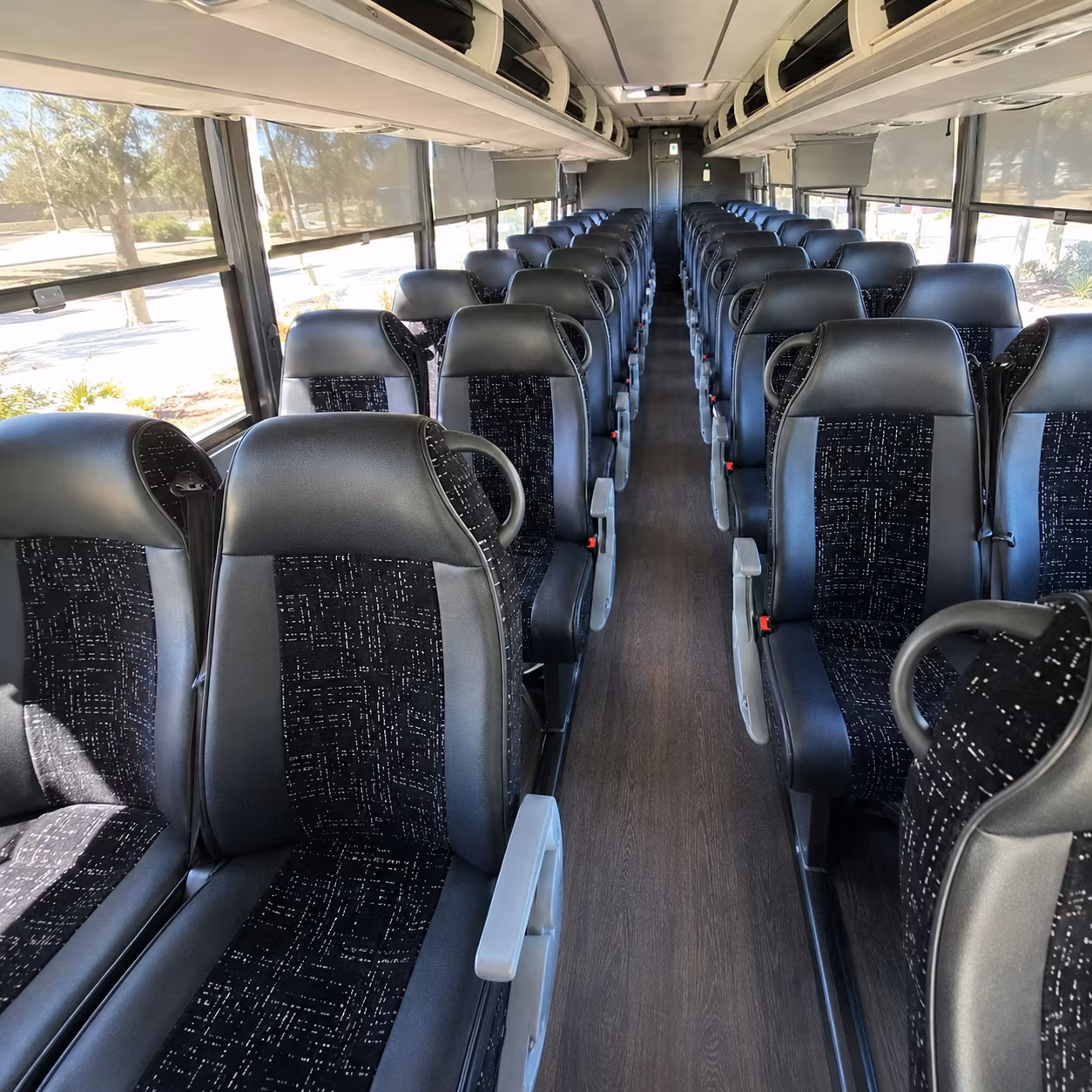 amherst 56 passenger charter bus inside